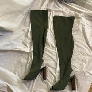 Green knee-high boots